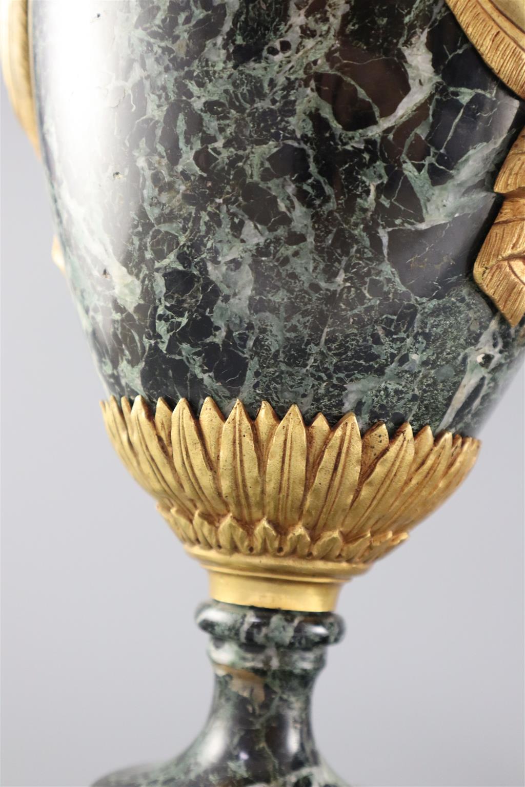 A pair of early 20th century ormolu green marble table lamps, overall height 20in.
